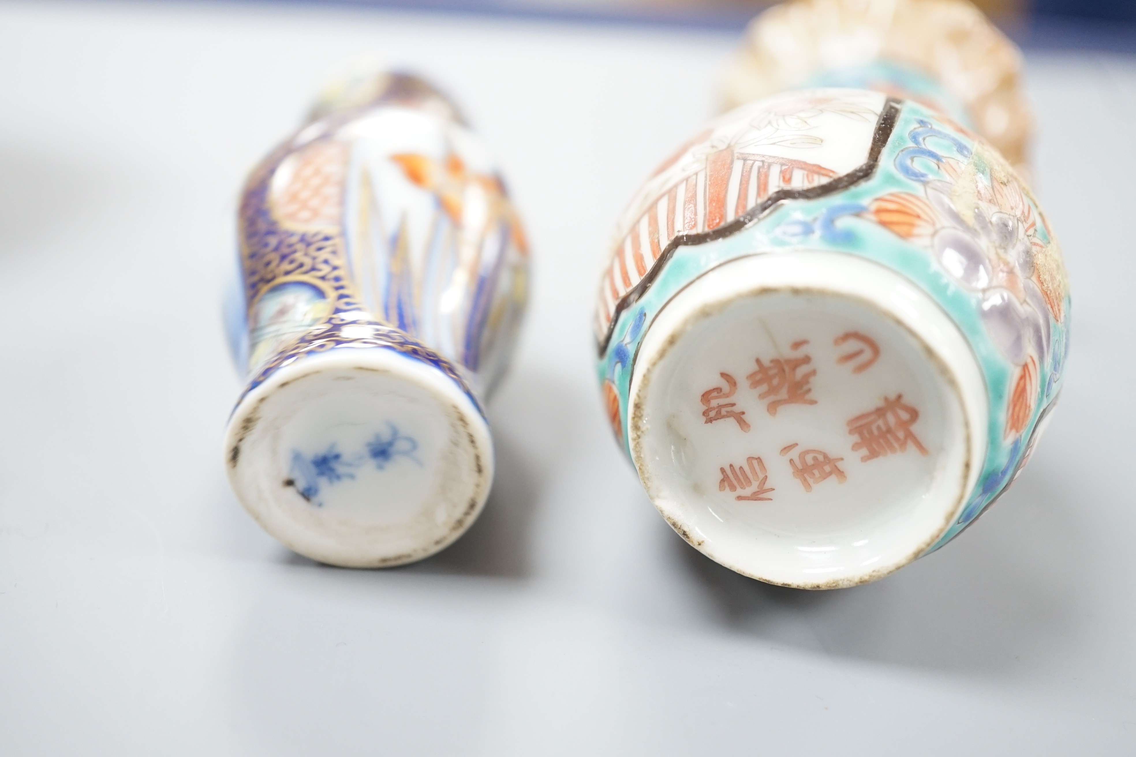 A group of Japanese small or miniature Kutani and Imari vessels and three Satsuma pottery mounted brooches, largest 11.7cm